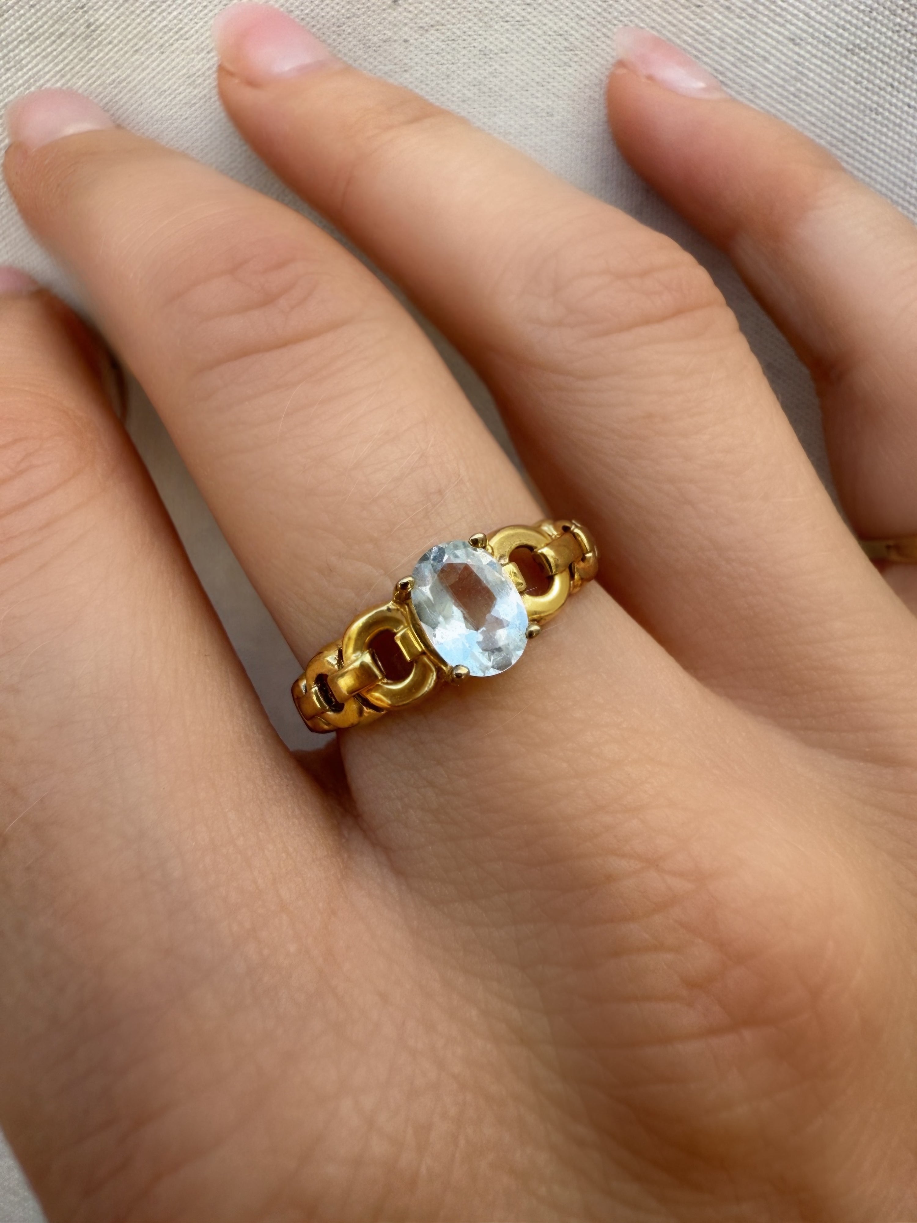 #113 8k Ring mit hellblauem Zirkon - RG 56