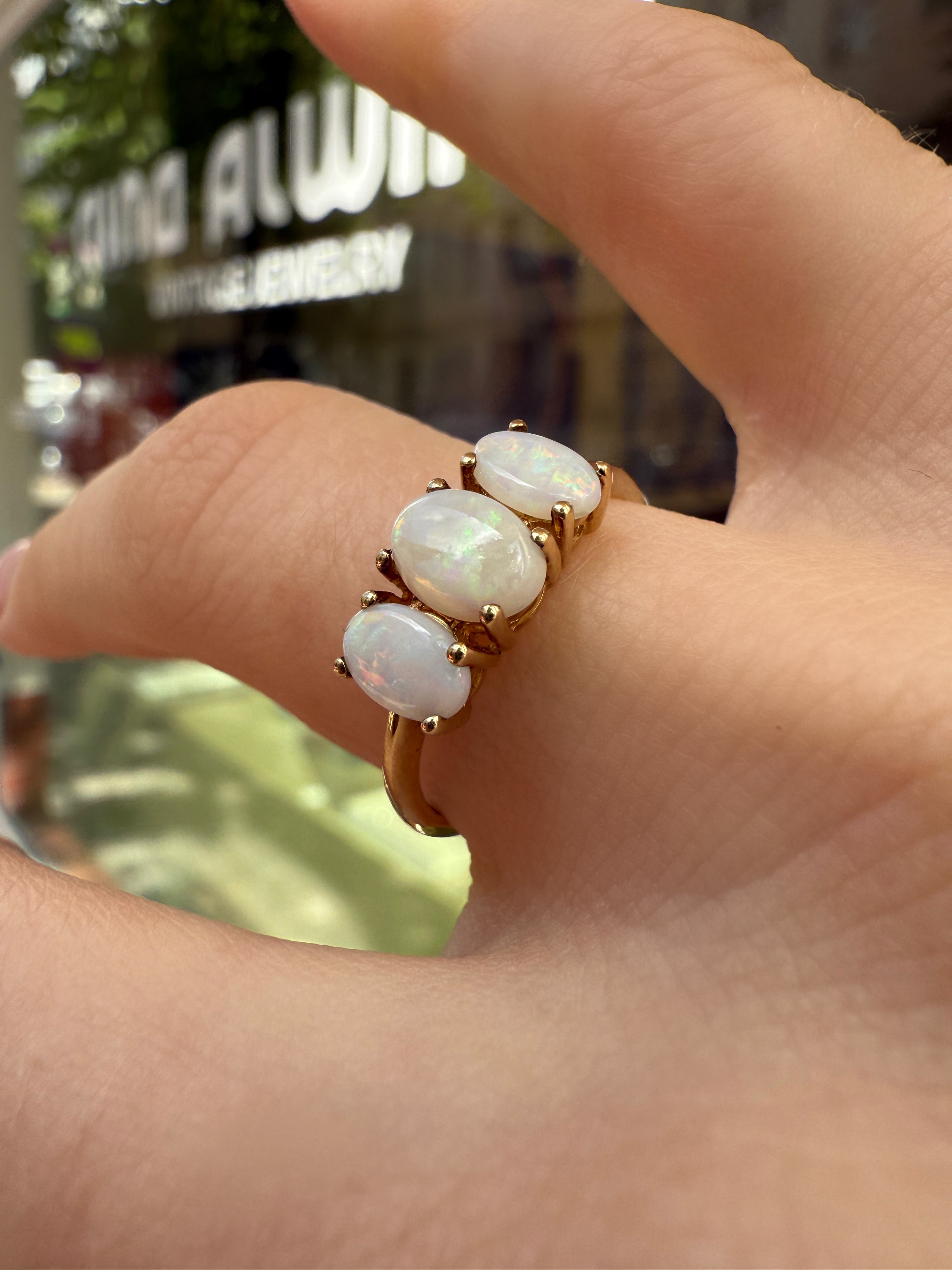 #1247 8k Ring mit 3 Opalen - RG 55