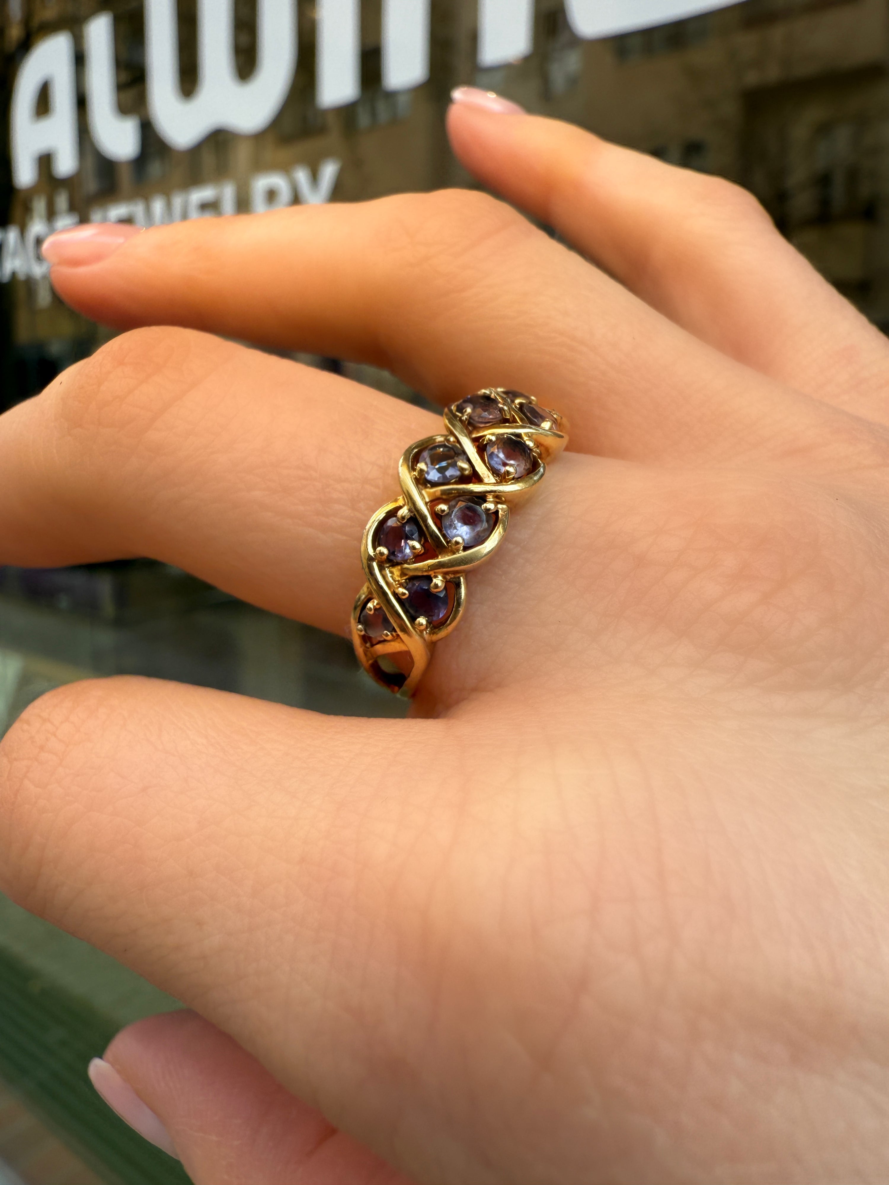 #810 9k Ring mit 10 Tansaniten - RG 63