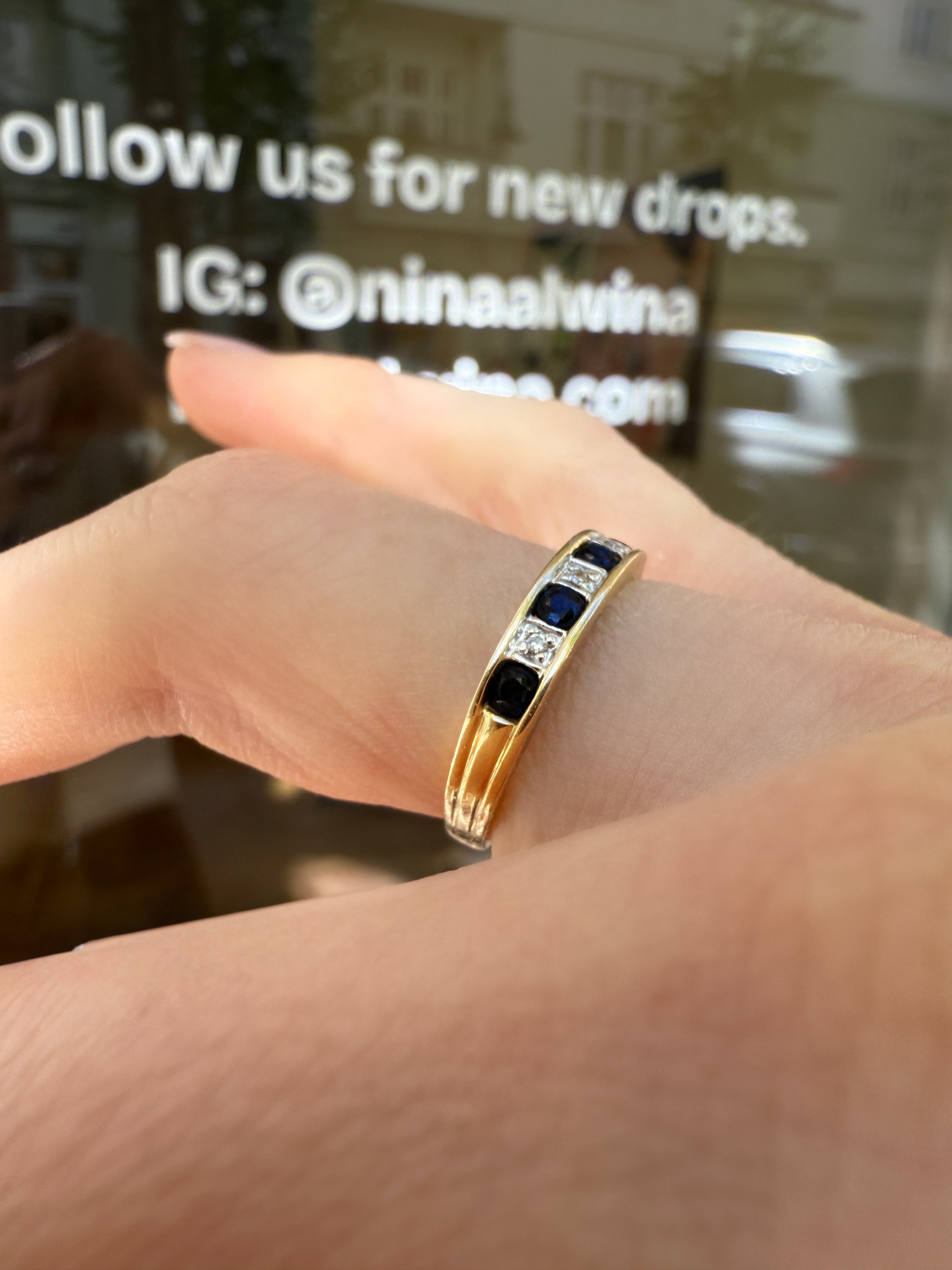 #918 9k Ring mit 4 Saphiren & 3 Diamanten - RG 54