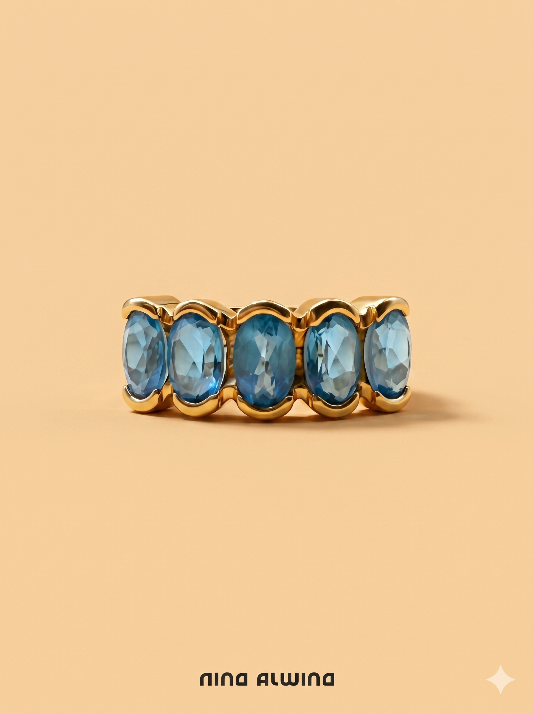 #713 9k Ring mit 5 Blautopas - RG 53