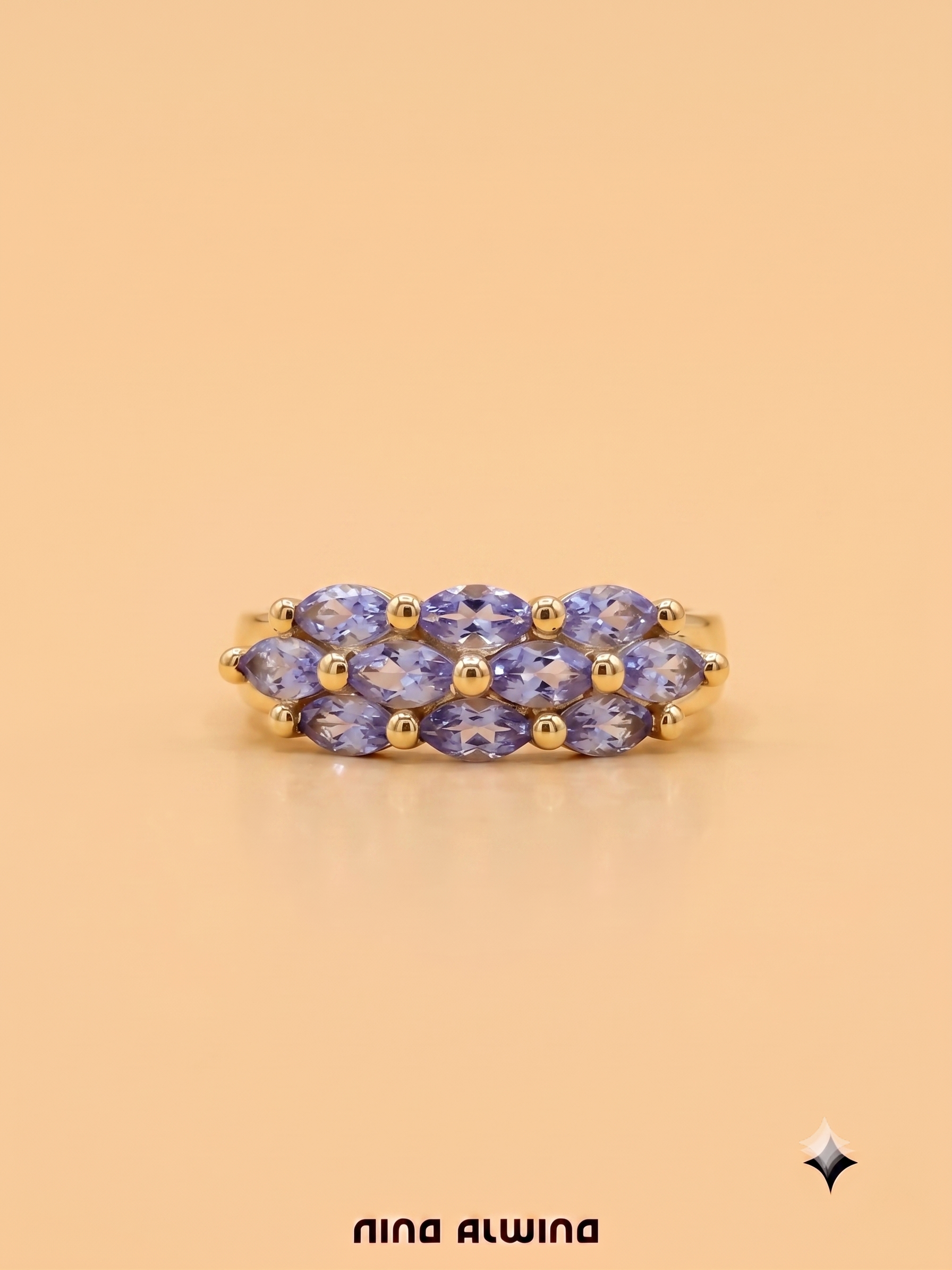 #1217 14k Ring mit Tansaniten - RG 56