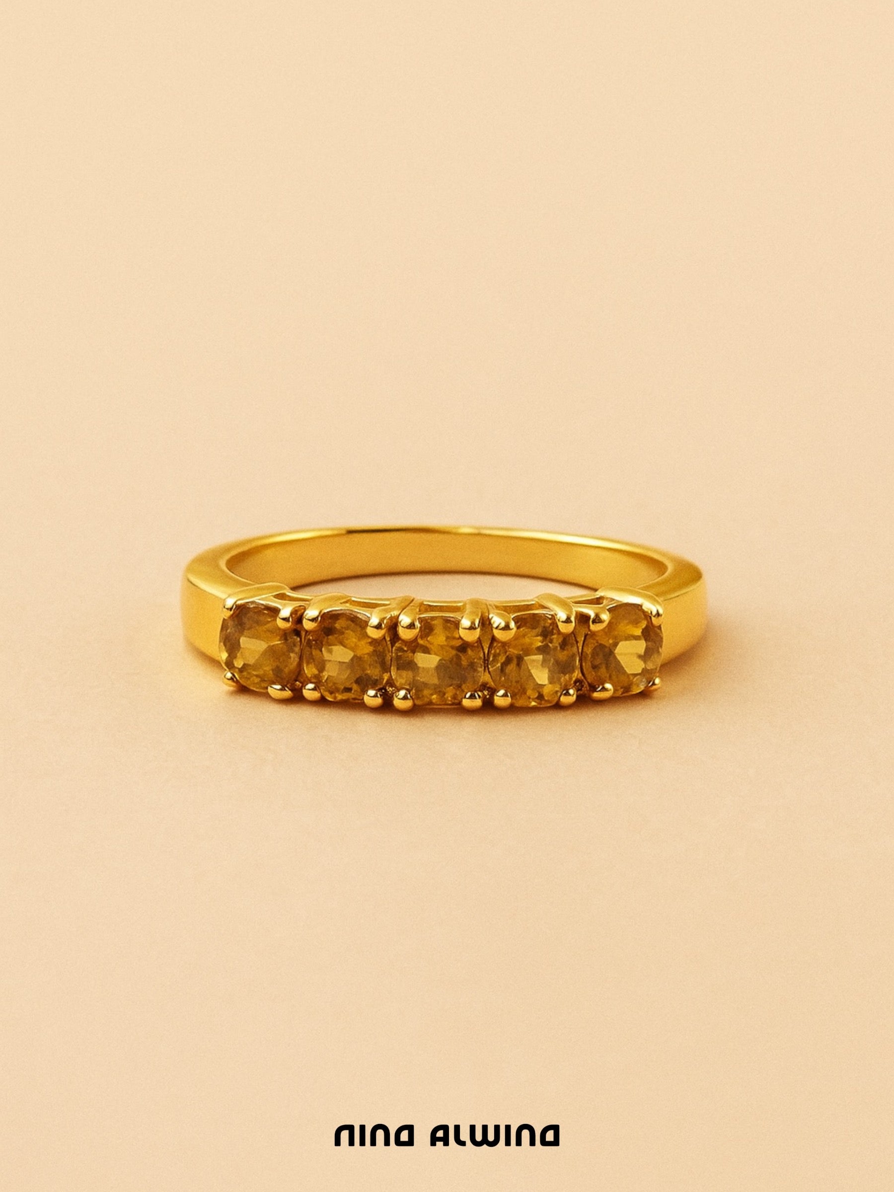 #323 9k Ring mit Sphen und Diamant - RG 54