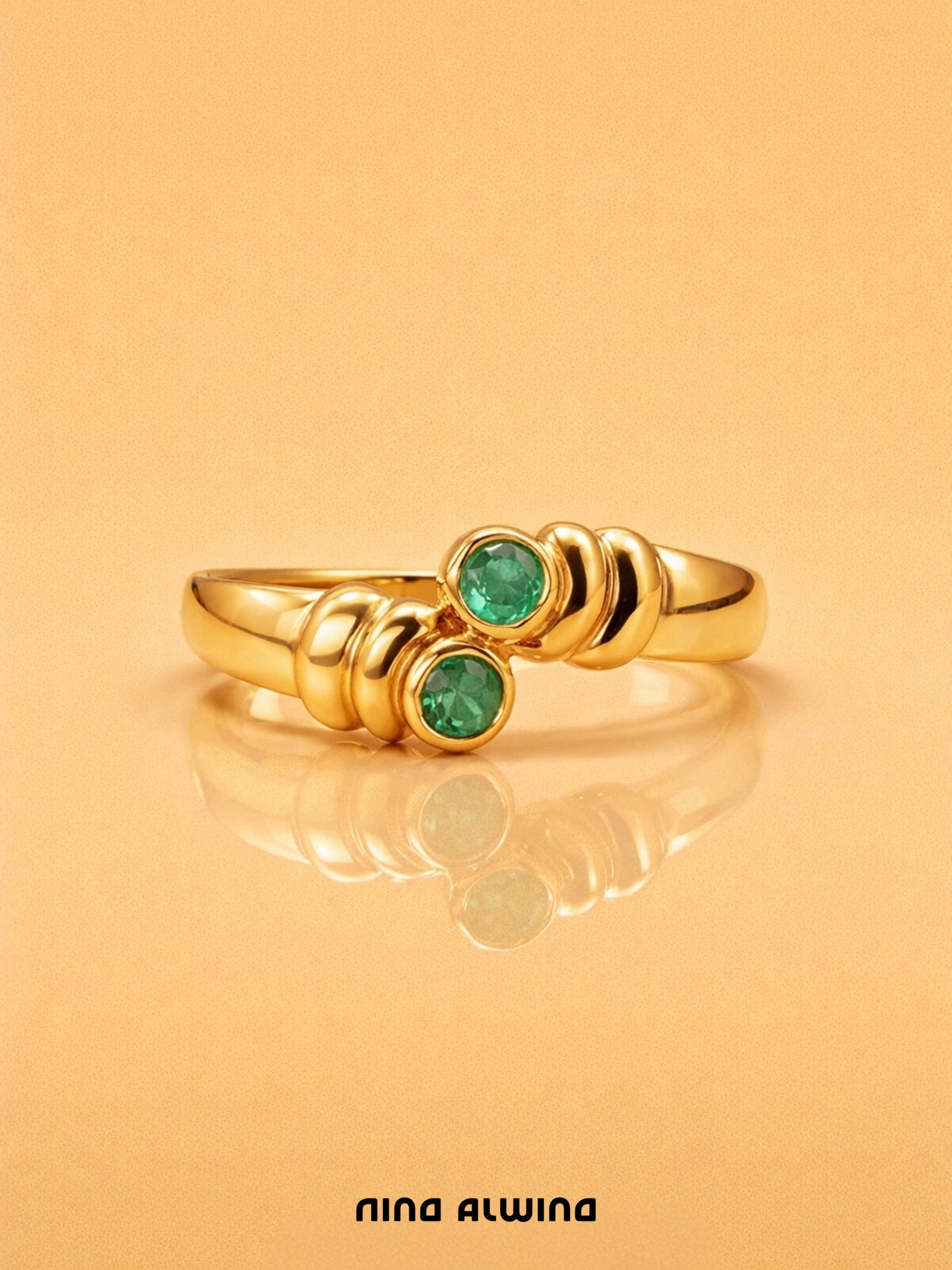 #519 8k Ring mit 2 Smaragden - RG 58