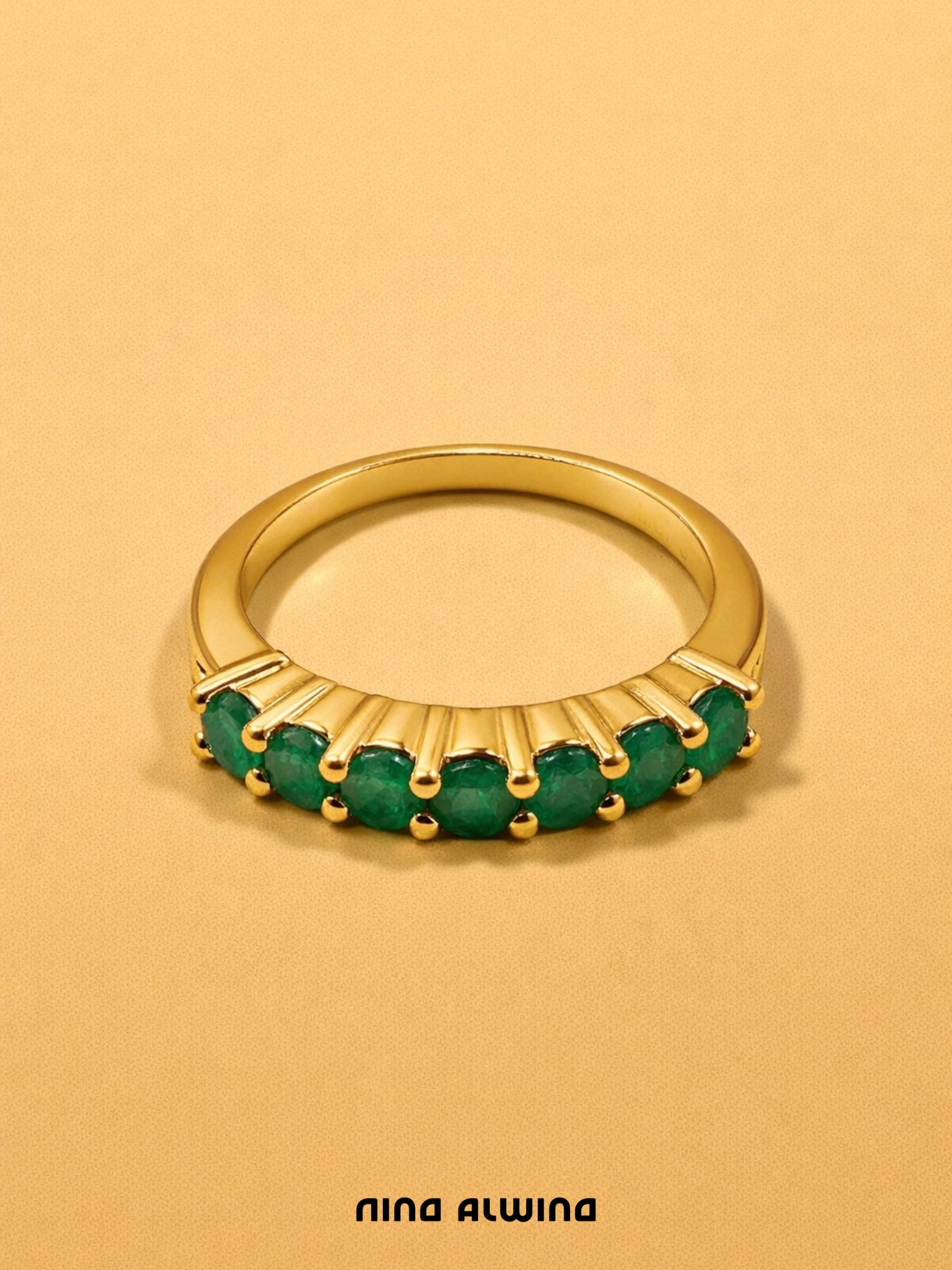 #557 9k Ring mit 7 Smaragden - RG 56