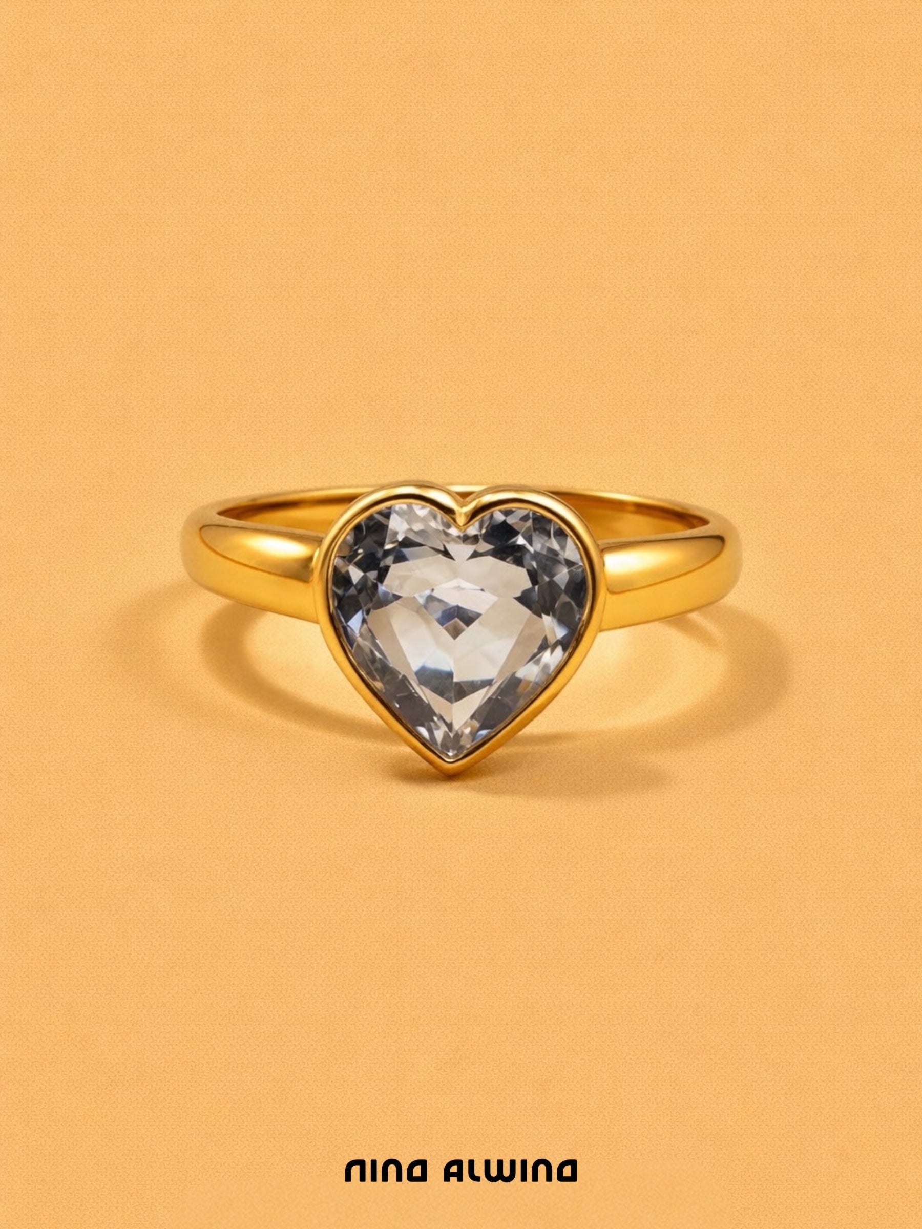 #564 8k Ring Herz mit blauem Topas - RG 52