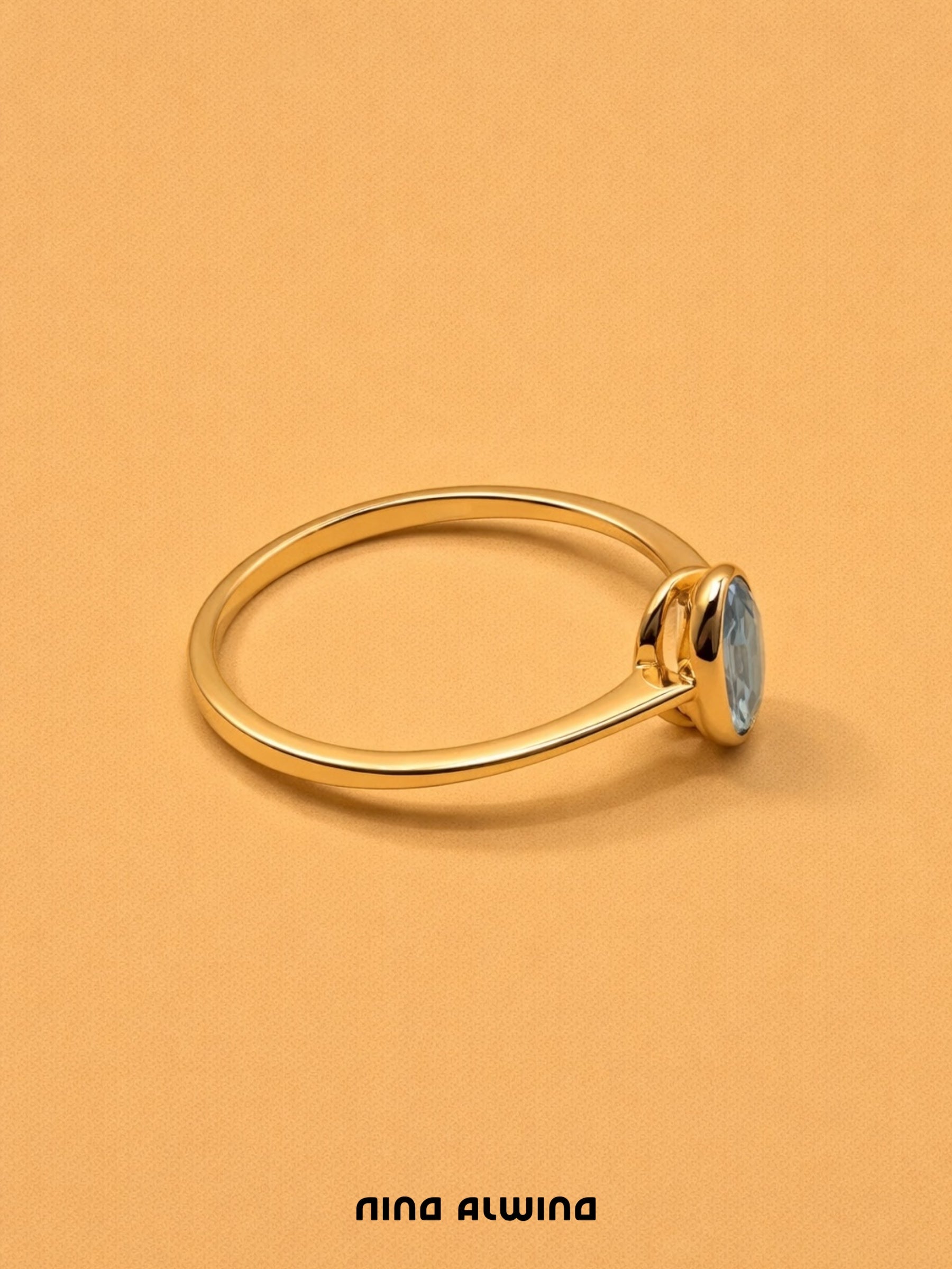 #677 14k Ring mit Blautopas - RG 54.5