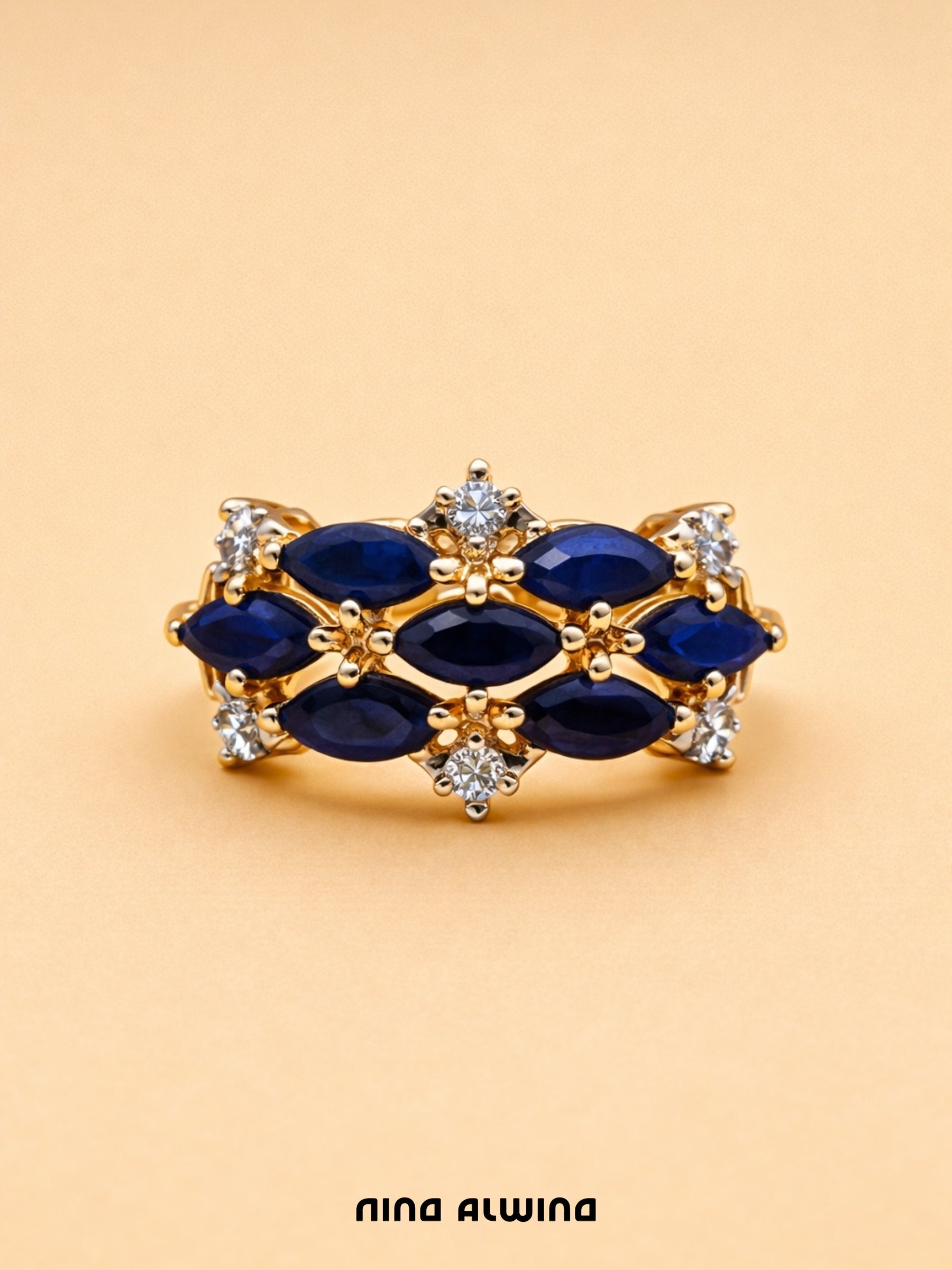 #654 9k Ring mit 7 Saphiren & 2 Diamanten - RG 53