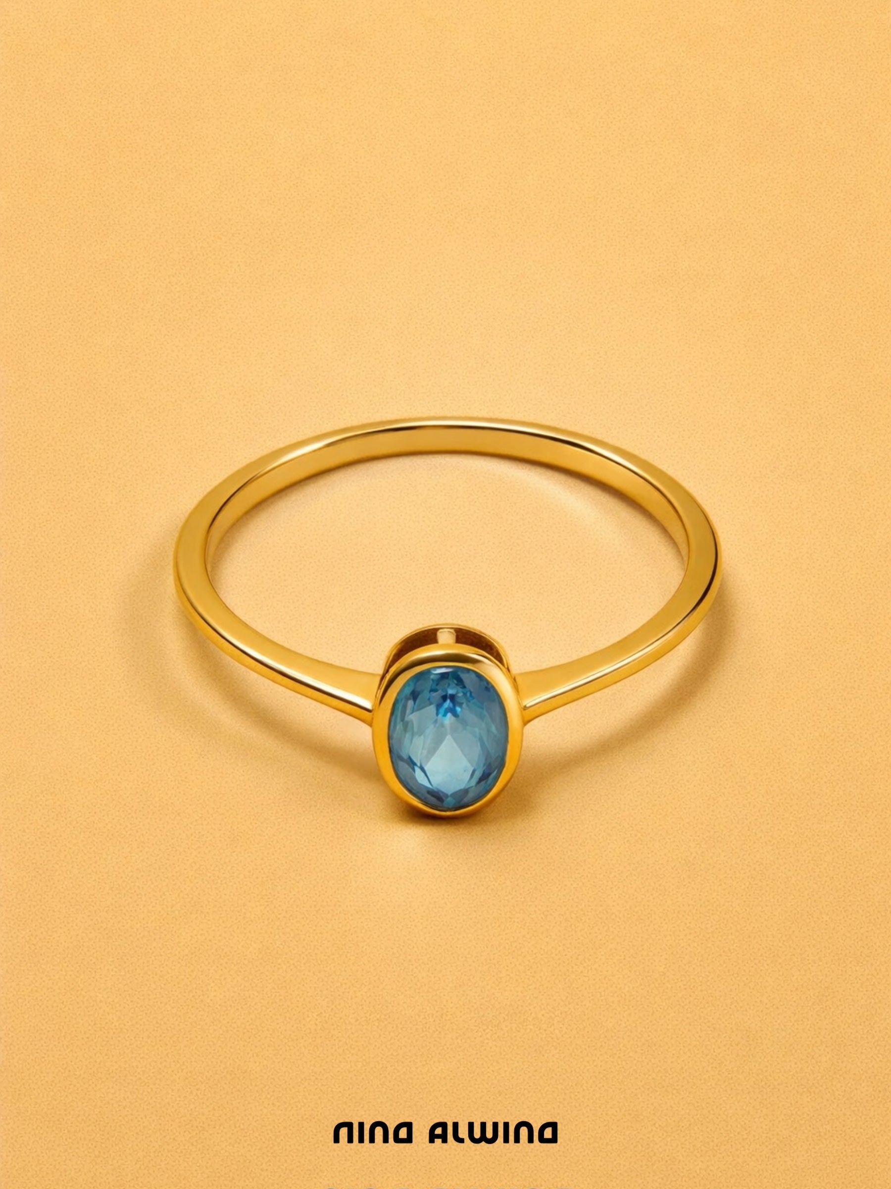 #677 14k Ring mit Blautopas - RG 54.5