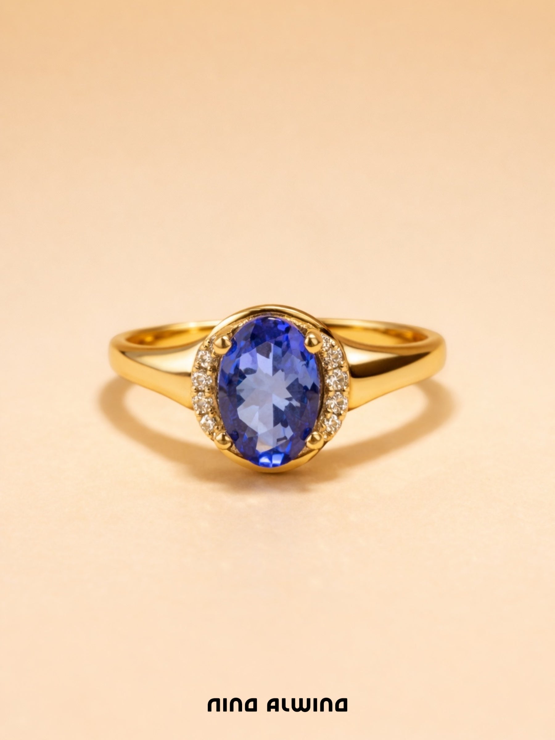 #701 9k Ring mit Tansanit & 8 Diamanten - RG 54