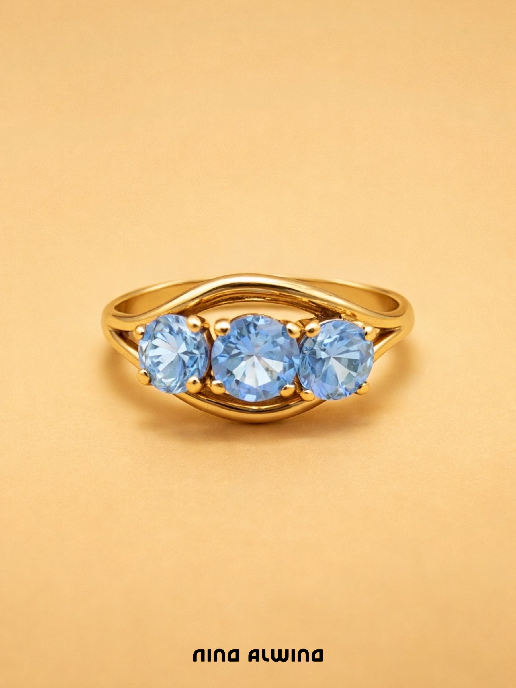 #720 8k Ring mit 3 Aquamarinen - RG  55.5