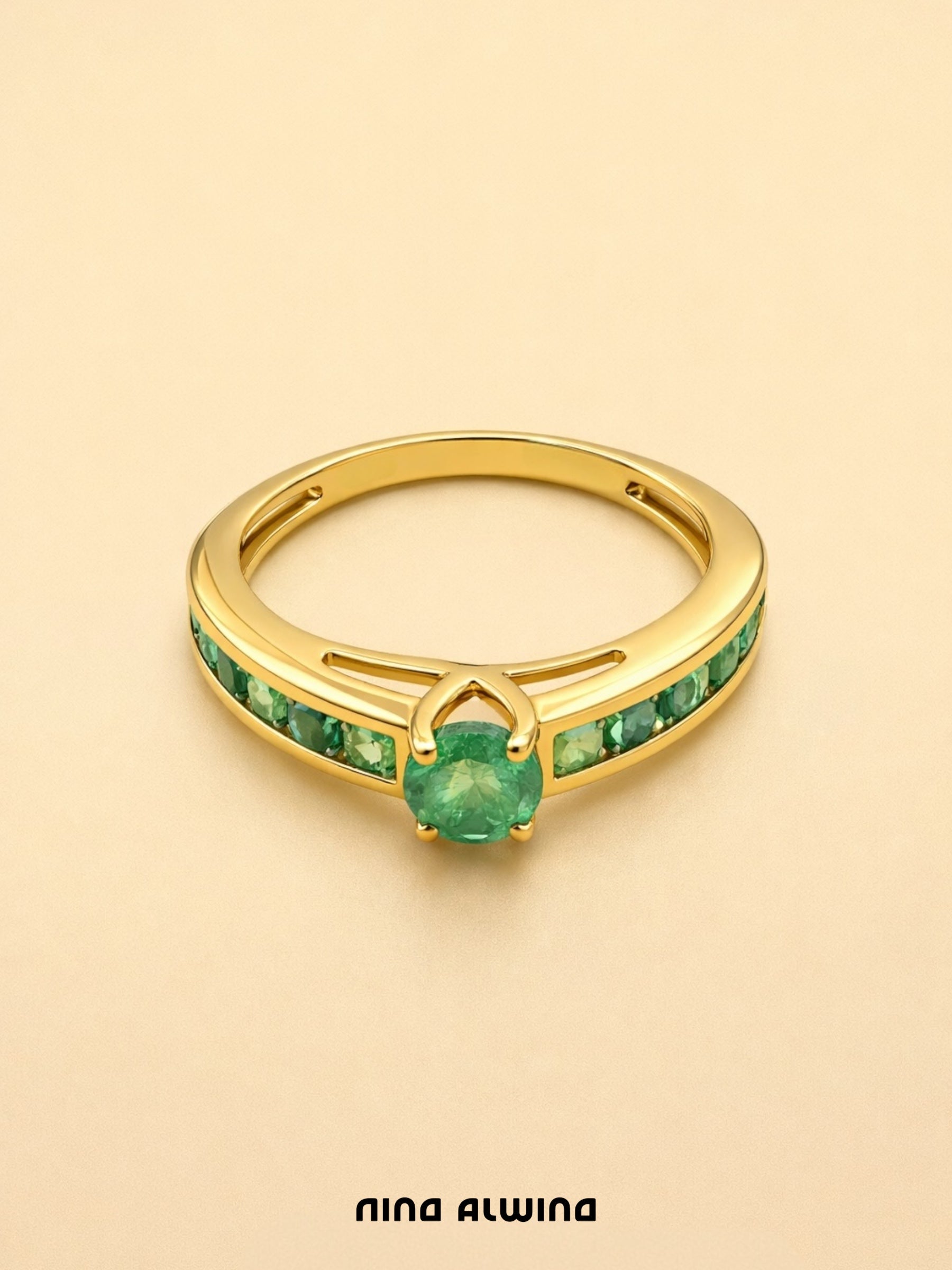 #795 9k Ring mit 11 Smaragden - RG 60