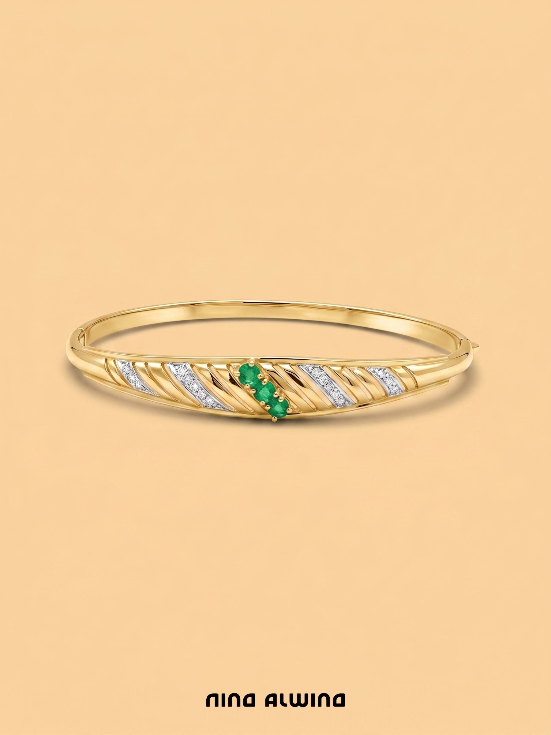 #1050 8k Armreif mit Smaragd & 6 Diamanten